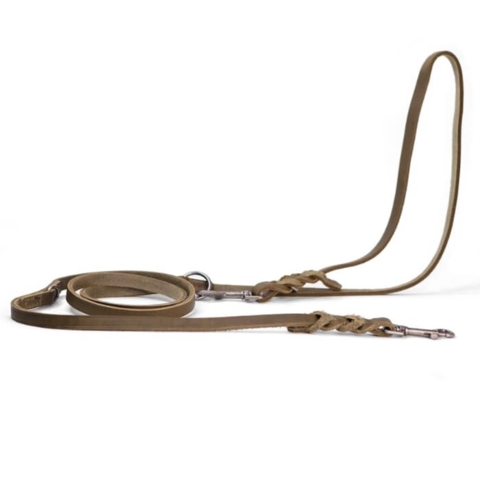 En kvalitets hundesnor i ægte læder. Ses her i en lækker grøn farve