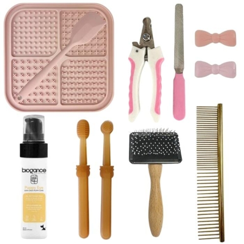 Komplet sæt med tandbørste, karte, kam, negleklipper, sløjfer, øjenrens og slikkeplade til din hvalp